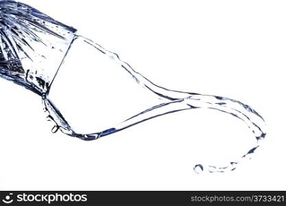 A beautiful shape created by the fluid motion of water splashing as it is thrown out of a glass