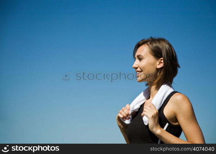 A beautiful sporty caucasian girl exercise outdoor