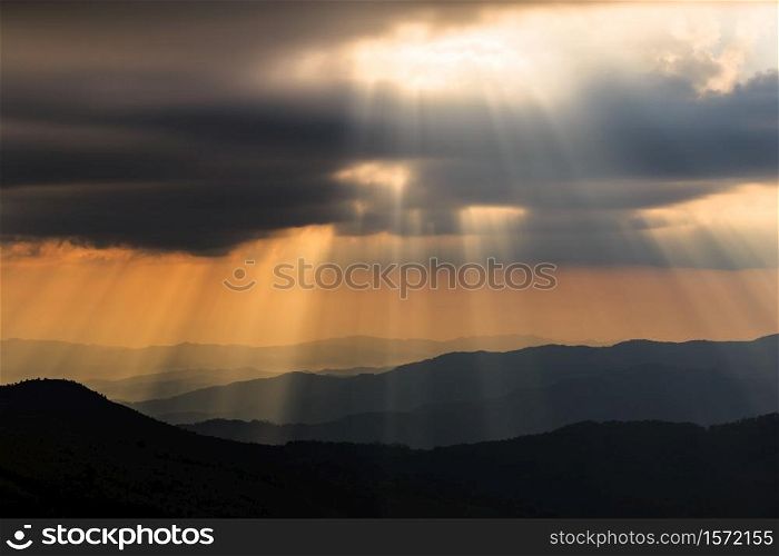 A beautiful sun rays with clouds in the morning used as for background