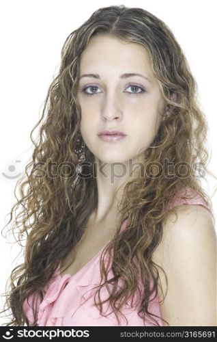 A beautiful teenage girl in pink top on white background