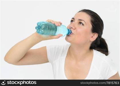 a beautiful thirsty woman drinking water