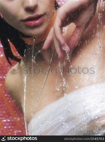 A beautiful woman in a shower.