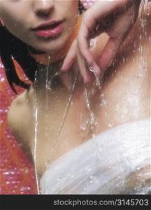 A beautiful woman in a shower.