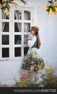 A beautiful woman in lolita dress in garden background Japanese street fashion portrait