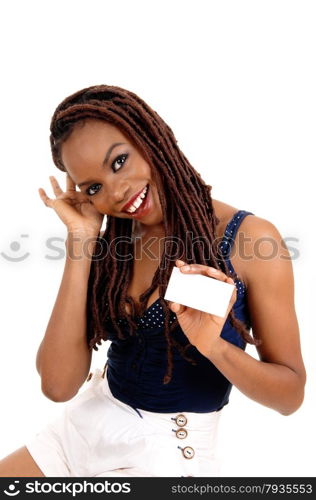 A beautiful young African American woman with long braided brown hair,holding her business card, isolated for white background.