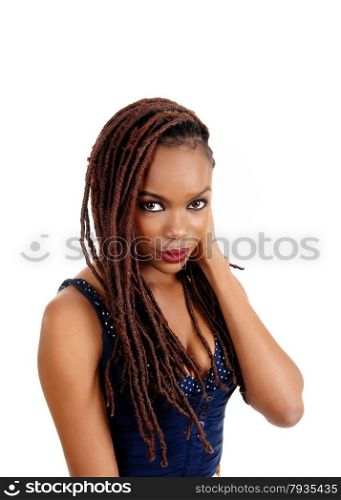 A beautiful young African American woman with long braided brown hair,with one hand on head, isolated for white background.