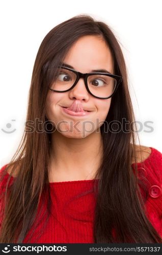 A beautiful young asian woman making a silly expression, isolated over white