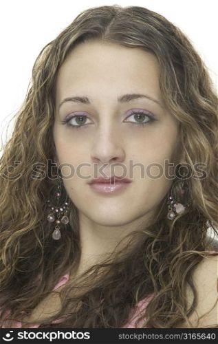 A beautiful young female model looking straight ahead