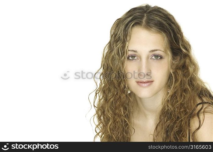 A beautiful young female model with amazing curly hair