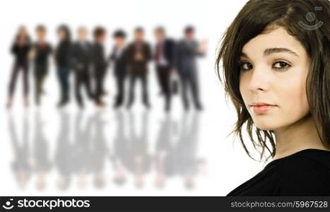 A beautiful young girl in front of a group of people, isolated