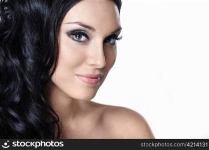 A beautiful young girl with makeup and hair on white background