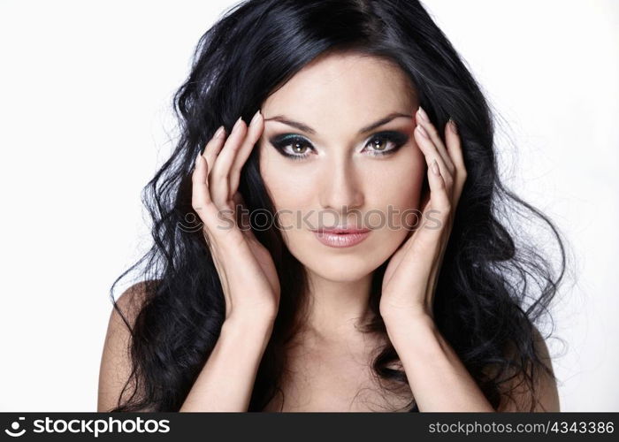 A beautiful young girl with makeup on white background