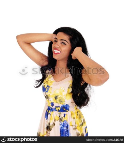 A beautiful young happy woman standing with her hands on her head,waist up, isolated for white background.
