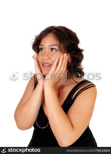 A beautiful young mixes raced woman in a portrait holding her face inboth of her hands, isolated for white background.