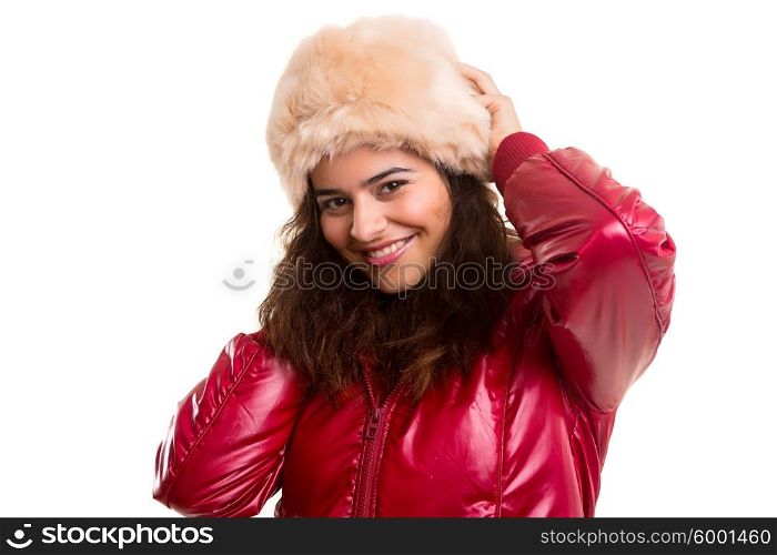 A beautiful young woman dressed for winter