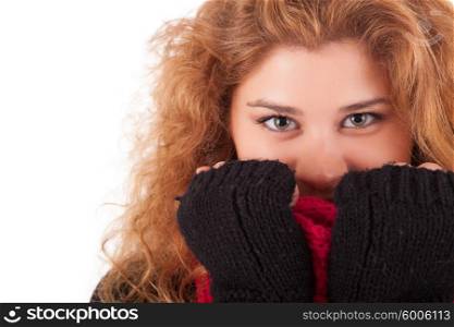A beautiful young woman dressed for winter
