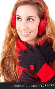 A beautiful young woman dressed for winter, over a white background