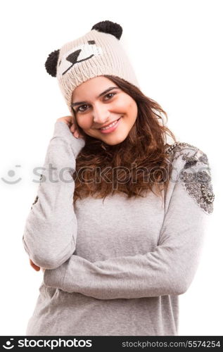 A beautiful young woman dressed with winter clothes