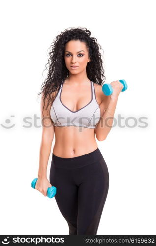 A beautiful young woman exercising - fitness concept