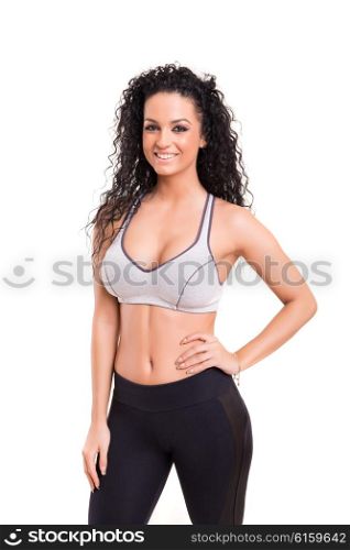 A beautiful young woman exercising - fitness concept