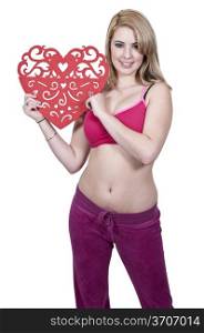 A beautiful young woman holding a Valentines Day heart