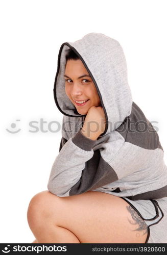 A beautiful young woman in a portrait picture in a gray hoodie, isolatedfor white background.