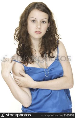 A beautiful young woman in a striking blue top