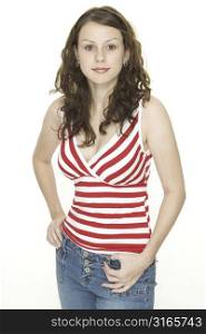 A beautiful young woman in a stripey red and white top and jeans