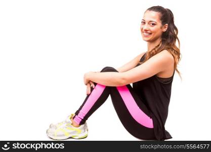 A beautiful young woman in great shape - fitness concept