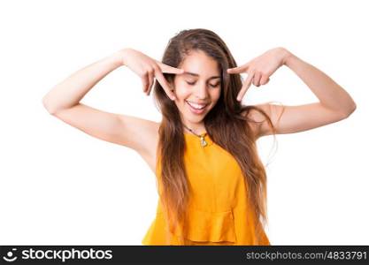 A beautiful young woman making a silly expression, isolated over white