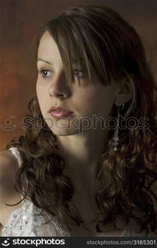 A beautiful young woman poses for a portrait