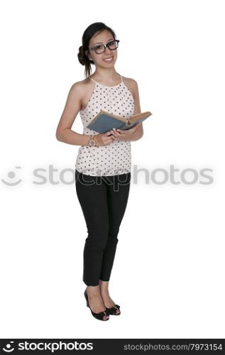 A beautiful young woman reading a book