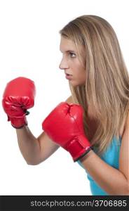A beautiful young woman wearing a pair of boxing gloves