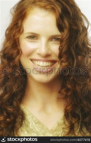 A beauty shot of a woman with red hair