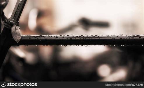 A bicycle rod with rain drops