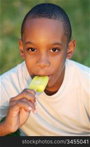 A black boy with a lemon ice cream