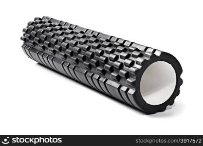 A black bumpy foam massage roller. Foam rolling is a self-myofascial release technique that is used by athletes and physical therapists to inhibit overactive muscles.