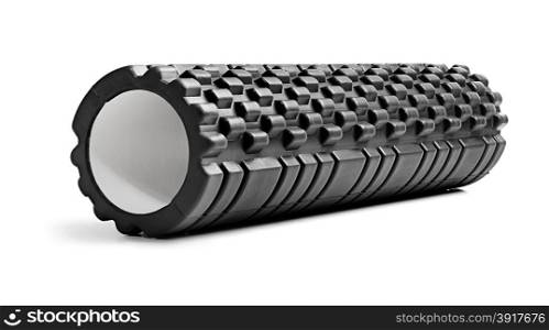 A black bumpy foam massage roller. Foam rolling is a self-myofascial release technique that is used by athletes and physical therapists to inhibit overactive muscles.