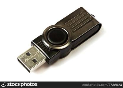 A black USB memory stick isolated on white background