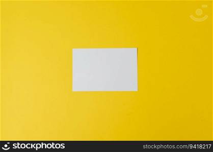 A blank card is placed on yellow background