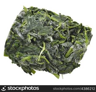 A Block Of Frozen Spinach Isolated On White Background
