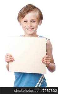 A blond boy holding a blank ad sign isolated on a white background