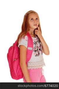 A blond pretty girl standing with her pink backpack for school, looking upand thinking, isolated for white background.