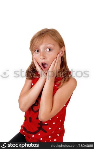 A blond young girl with a wait open mouth can not believe what she sea&rsquo;s,isolated on white background.