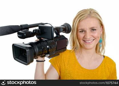 a blond young woman with professional video camcorder, on white