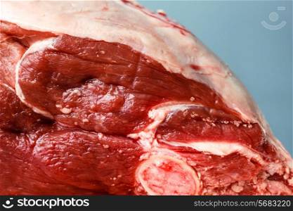 A bloody red joint of raw meat