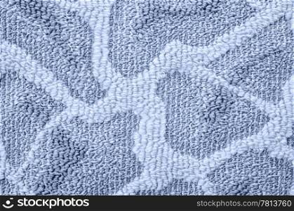 a blue grey floor carpet with a relief pattern