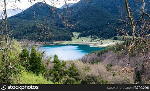 A blue lake in the mountains - landscape.