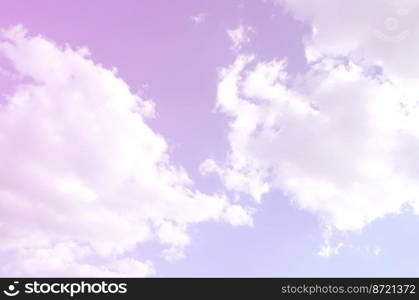 A blue sky with lots of white clouds of different sizes