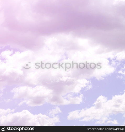 A blue sky with lots of white clouds of different sizes